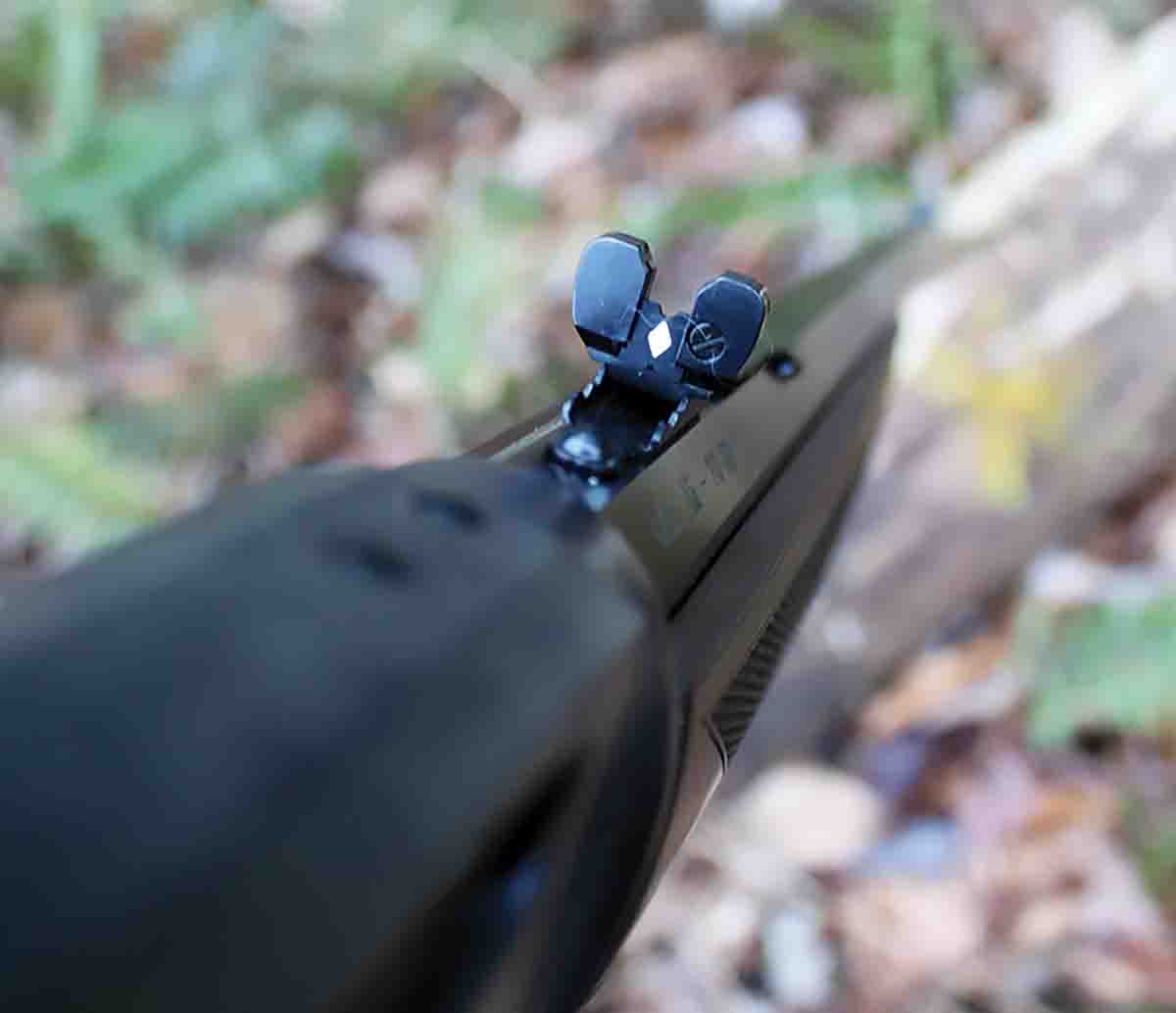 The rear sight is the classic semi-buckhorn with notch and diamond insert. The front sight is a gold bead.